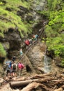 Tourists climbing iron ladders in Slovak Paradise Royalty Free Stock Photo