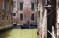 Tourist family rides a gondola tour