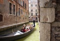 Tourist family rides a gondola tour