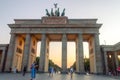 Tourist at famous Brandenburg Gate one of the most famous monuments in Berlin.