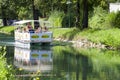 Tourist ferry boat crossing a river. Near lake WÃÂ¶rthersee. Klagenfurt, Austria