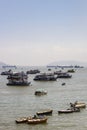 Tourist and fishing boats in the bay in front of the Gateway of India, Mumbai, Maharashtra, India Royalty Free Stock Photo