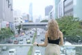 Tourist foreigner is sightseeing traffic and city view at Bangkok Royalty Free Stock Photo