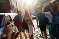 Tourist friends discovering city on foot Royalty Free Stock Photo