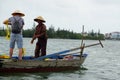 tourist gets teached in traditional net fishing
