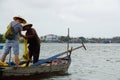 tourist gets teached in traditional net fishing