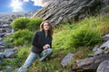 Tourist girl and a beautiful mountain pass in the Khibiny mountains. Russia