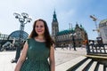 Tourist girl in front of the The Hamburg Rathaus in Germany