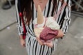 Tourist girl holding tasty traditional italian gelatto ice cream in her hands Royalty Free Stock Photo