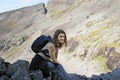 Tourist girl on a mountain pass in the Khibiny mountains. Russia Royalty Free Stock Photo