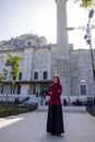 Tourist girl posing in front of Fatih mosque in Istanbul Royalty Free Stock Photo