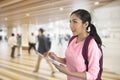 Tourist girl using computer tablet finding traveling information