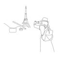Tourist girl taking photo of Eiffel tower in Paris Royalty Free Stock Photo