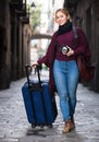 Tourist girl walking with the travel bag Royalty Free Stock Photo