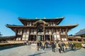 Tourist go to Todaiji Temple Hall for worship Great Buddha on Holiday at Nara, Japan. Royalty Free Stock Photo