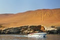 Tourist group in a boat near Candelabra of the Andes in Pisco Ba Royalty Free Stock Photo