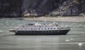 Tourists Exploring Glacier Bay Alaska on a Small Adventure Cruise Ship