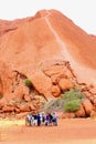 Tourist group starts the climbing track of Uluru Ayers Rock, Australia Royalty Free Stock Photo