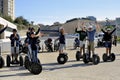 Tourist group moving Segway