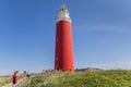 Tourist group visiting the lighthouse on Texel island