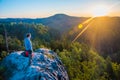 A tourist guy and beautiful morning sunrise of the Marienfels Viewpoint, Bohemian Switzerland, National Park Bohemian Switzerland,