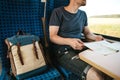 A tourist or a guy or a student travels by train. Royalty Free Stock Photo