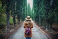 Tourist in hat at cypress alley