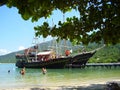 Tourist having fun on a pirate pleasure boat