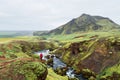 Tourist on a hike in Iceland near the Skoga River