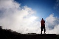 Tourist hiking in Haleakala volcano crater on the Sliding Sands trail.