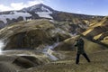 Tourist photographing nature in Iceland