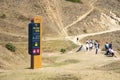 Tourist information pole indicating the place of Kok Zhailau and campsite in Almaty mountains, Kazakhstan
