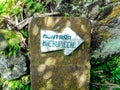 Tourist information sign board guiding travel hike direction to Machu Picchu mountain peak of peruvian Inca ruin