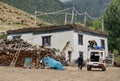 A tourist jeep stopped near a house in the village of Samar 3660m while traveling through the Kingdom Mustang in Nepal.