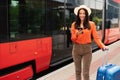 Tourist Lady With Suitcase Booking Railway Tickets Near Train Outdoor
