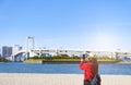 Tourist with landscape view at Daiba beach and Rainbow bridge at Tokyo Japan Royalty Free Stock Photo