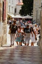 tourist in Little tipical street in the old town of Dubrovnik Royalty Free Stock Photo