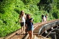 Tourist and local people on bridge.