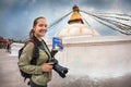 Tourist with Lonely Planet guide in Nepal