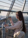 Tourist look observant binoculars telescope on panoramic view Royalty Free Stock Photo