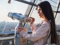 Tourist look observant binoculars telescope on panoramic view Royalty Free Stock Photo
