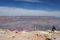 Tourist looking at Grand Canyon