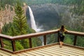 Tourist looking at Helmcken Falls in Wells Gray Provincial Park, British Columbia, Canada Royalty Free Stock Photo