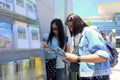 Tourist looking korea travel guide brochures at Gapyeong Station, South Korea Royalty Free Stock Photo