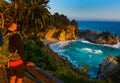 Tourist looking at McWay Falls Big Sur California Royalty Free Stock Photo