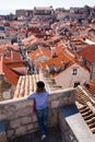 Tourist looking over the roofs Royalty Free Stock Photo