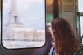 Tourist looking to the Eiffel Tower in Paris