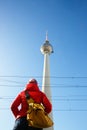 Tourist looking at TV Tower, Fernsehturm, Berlin