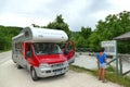 A tourist looks the map to go Oxya Viewpoint in the park national of Vikos-Aoos in Greece Royalty Free Stock Photo