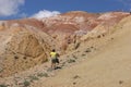 A tourist looks at the Martian landscapes in Altai